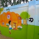 Pintura do muro do parquinho da Educação Infantil.